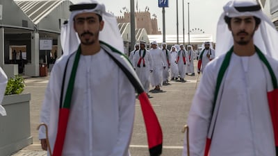 Emiratis prepare for the UAE Union Parade at the festival.