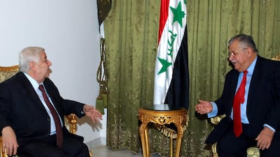 Iraqi President Jalal Talabani meets with Syrian Foreign Minister Walid Al Moalem in Baghdad, November 20, 2006. AFP