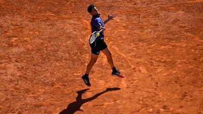 Thiem unleashes a shot from the back of the court.