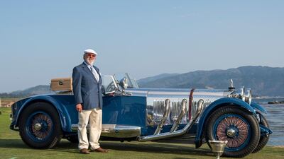 Bruce McCaw stands for a photograph next to his 1929 Mercedes-Benz S Barker Tourer after winning the Best of Show award during the 2017 Pebble Beach Concours d'Elegance in Pebble Beach, California, U.S., on Sunday, Aug. 20, 2017. Official estimates for the Pebble Beach auctions this week have set sales totals at $290 million, down 14 percent since 2016. The downshift in overall sales isn't for lack of funds among buyers, but rather a decrease that comes because classic cars of this caliber are a finite resource. Photographer: David Paul Morris/Bloomberg