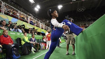 Simone Biles of USA stretches during the women’s gymnastics individual all-around final at the 2016 Rio Olympics at Rio Olympic Arena on August 11, 2016 in Rio de Janeiro, Brazil. Dylan Martinez / Reuters