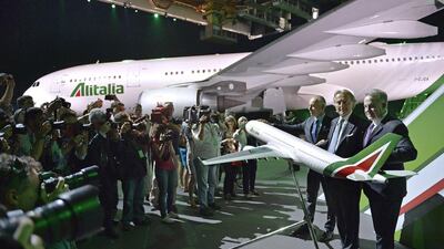 James Hogan, far right, the chief executive of Etihad, says Etihad’s investments in airlines in key markets were made with three goals in mind: access, synergies and a chance for those carriers to reshape themselves. Andreas Solaro / AFP