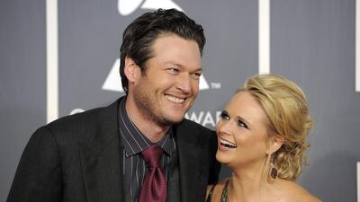 Blake Shelton, left, and Miranda Lambert announced their divorce after four years of marriage on Monday, July 20, 2015. Chris Pizzello / AP Photo