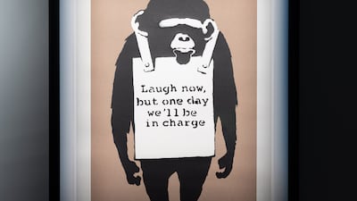 Laugh Now by Banksy.