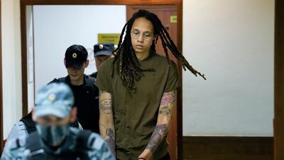 WNBA star and double Olympic gold medallist Brittney Griner is escorted to a hearing, in Khimki outside Moscow. AP
