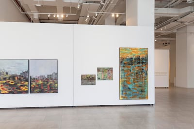 Nujoom Alghanem is best known for her filmmaking, but Unseen Script highlights another side of the Emirati artist’s multidisciplinary practice through a selection of paintings. Antonie Robertson / The National