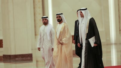 BEIJING, CHINA - APRIL 25: United Arab Emirates Vice President and Prime Minister Sheik Mohammed bin Rashid al Maktoum (center) walks towards Chinese President Xi Jinping (not pictured) before a bilateral meeting of the Second Belt and Road Forum at the Great Hall of the People on April 25, 2019 in Beijing, China. (Photo by Andrea Verdelli/Pool/Getty Images)