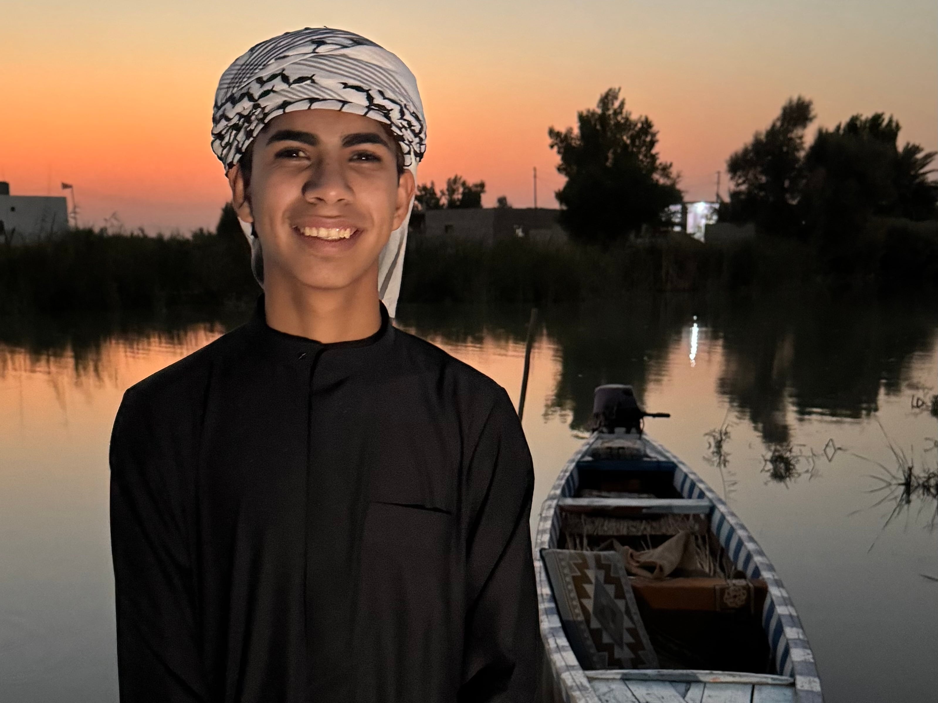 Image linked from the original feed: Meet The Marshes Boy, the teenager introducing the world to Iraq's ancient wetlands