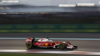 Ferrari driver Sebastian Vettel of Germany steers his car during the Emirates Formula One Grand Prix at the Yas Marina racetrack in Abu Dhabi, United Arab Emirates, Sunday, Nov. 27, 2016. (AP Photo/Hassan Ammar)
