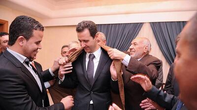 Bashar Al Assad, in a picture uploaded to his Facebook site on Wednesday. New claims have emerged that Mr Al Assad’s regime has hidden some of his chemical weapons, transferring some of its stockpile just hours after Russia and the US concluded a deal for Syria to dismantle the weapons to avoid a US military strike. Facebook via AFP