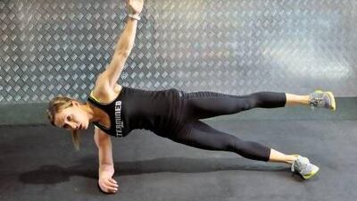 With legs straight and stacked, extend your top leg upwards and hold for 10 seconds. Charles Crowell for The National