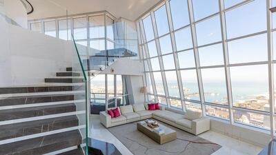 The impressive space is located across three floors.