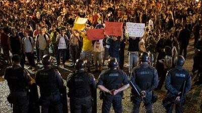 Brazilians have been demanding the government do something about the country's economy. Felipe Dana / AP Photo