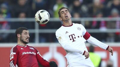 Ingolstadt's Mathew Leckie and Bayern Munich's Phillip Lahm, right, in action. Michael Dalder / Reuters
