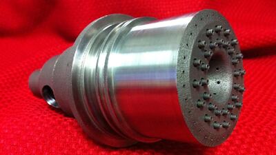 A rocket engine injector manufactured with 3D printing machine. Nasa / MSFC