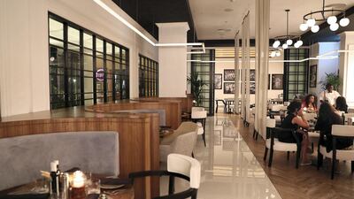 The vast restaurant is made up of large tables and intimate booths. The National