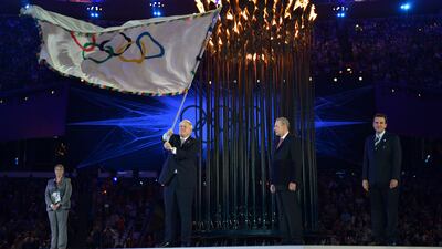 The Olympic Flag is passed from Mr Johnson to IOC President Jacques Rogge during the closing ceremony of the London 2012 Olympic Games. Getty Images