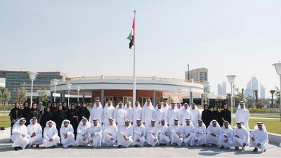 The staff of the Abu Dhabi Crown Prince Court pose for a photo outside Union House after visiting the Etihad Museum and Dubai Water Canal in Dubai. Wam