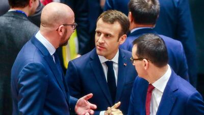 French President Emmanuel Macron with Belgian Prime Minister Charles Michel, left. AP