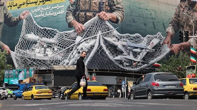 A giant billboard reading 'The Strait of Hormuz remains closed' at Revolution Square in Tehran on April 28. AFP