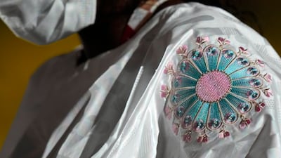 A team member of Gambia walks during the opening ceremony in the Olympic Stadium at the 2020 Summer Olympics.