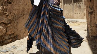 Shadowland: Dress, Dh28,000, Celine. gat Dh139 & Other Stories, earrings, Dh323 Cult Gaia at ShopBop, boots Dh2,405, Stuart Weitzman. 