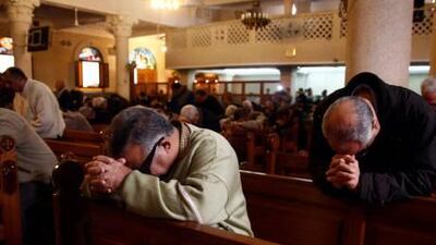 Christians at the Al Qiddissin Coptic church in Alexandria attend yesterday's mass.