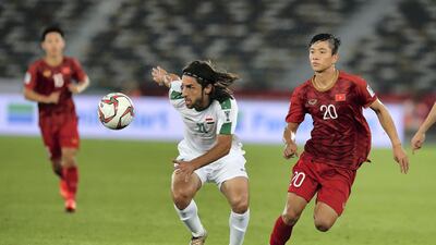 Humam Faraj, No 11, of Iraq in action against Vietnam during their Asian Cup opener at Zayed Sports City Stadium in Abu Dhabi. Iraq won 3-2.