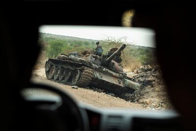 A destroyed tank is seen by the side of the road south of Humera, in an area of western Tigray annexed by the Amhara region during the ongoing conflict in Ethiopia. AP