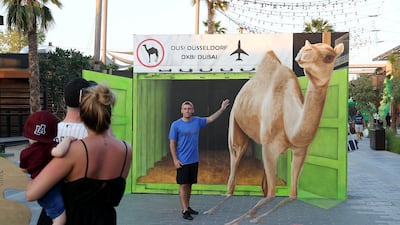 People taking photos with 3D art work by Frederike Wouters at the Dubai Canvas held at La Mer in Dubai. Pawan Singh / The National
