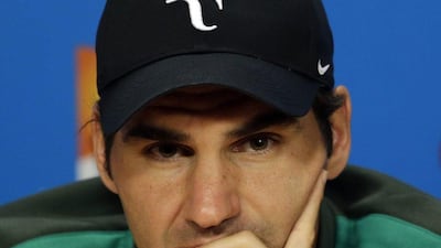 Roger Federer shown at a press conference ahead of the Australian Open on Saturday. Mast Irham / EPA