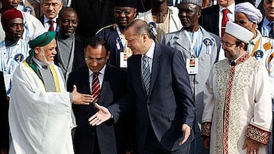 Tayyip Erdogan, the Turkish prime minister, centre right, predicted that Bashar Al Assad, the Syrian premier's days are numbered.