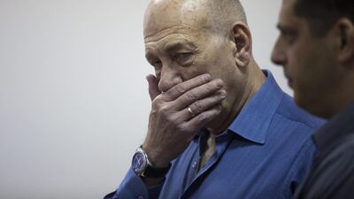 Former Israeli prime minister Ehud Olmert attends his trial at the Jerusalem District Court on May 25. AP
