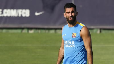 Barcelona's Arda Turan shown at a training session during the pre-season in July. Gustau Nacarino / Reuters / July 13, 2015