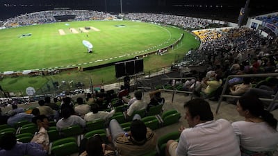 Pakistan cricket supporters watch a match against New Zealand in Abu Dhabi in November 2009. Karl Jeffs / AP