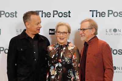 Actors Tom Hanks, from left, Meryl Streep and director Steven Spielberg pose for photographers during a photo call for the film The Post in Milan, Italy. Antonio Calanni / AP
