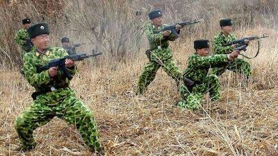 North Korean soldiers with weapons attend military training in this picture released by the country’s official KCNA news agency.