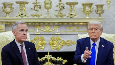 US President Donald Trump and Canadian Prime Minister Mark Carney during Tuesday's meeting in the Oval Office. Bloomberg