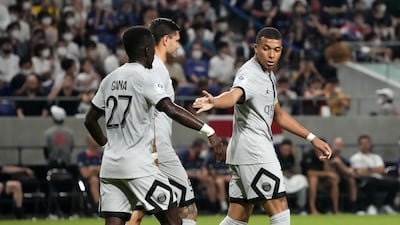 Kylian Mbappe celebrates after scoring PSG's sixth goal. Getty