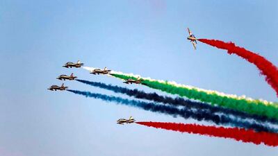 The Emirates Knights team decorates the Yas Marina Circuit before the Formula One race begins. Jorge Ferrari / Wam
