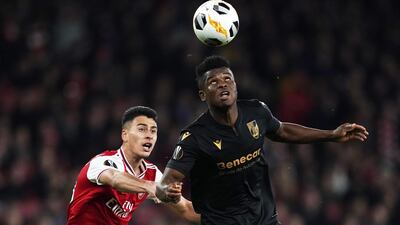 Arsenal's Gabriel Martinelli, left, in action against Mikel Agu of Vitoria SC during the Europa League Group F match at the Emirates Stadium on October 24. EPA