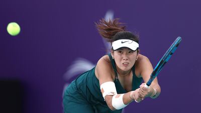 Zhaoxuan Yang of China plays a backhand against Sofia Kenin of USA during their Women's Singles match on Day Two of the Abu Dhabi WTA Women's Tennis Open. Getty Images