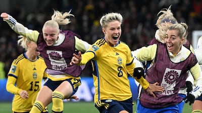 Sweden forward Lina Hurtig, centre, and teammates celebrate after their penalty shoot-out win against the USA in Melbourne on August 6, 2023. AFP