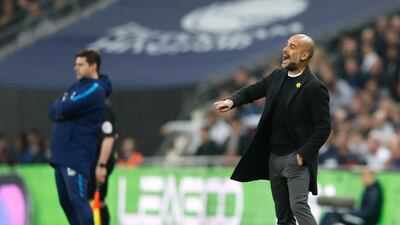 Tottenham manager Mauricio Pochettino, left, and Manchester City manager Pep Guardiola watch on from the touchline. Frank Augstein / AP Photo