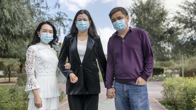Yilin Huang along with her mother in law Guanghui Wu and her father in law Fabing Li Yilin. Antonie Robertson / The National