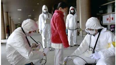In this March 24, 2011 file photo, a young evacuee is screened at a shelter for leaked radiation from the damaged Fukushima nuclear plant in Fukushima, Fukushima prefecture, Japan. The March 11 earthquake and tsunami caused massive death and destruction across northeastern Japan. But those who live near the crippled Fukushima Dai-ichi nuclear plant face a burden atop the losses they've already suffered: a fear of radiation that experts say could prove more unhealthy in the long run than the still-low levels of leaked radiation itself. (AP Photo/Wally Santana, File) *** Local Caption *** TOK102_Japan_Exposure_Anxiety.jpg