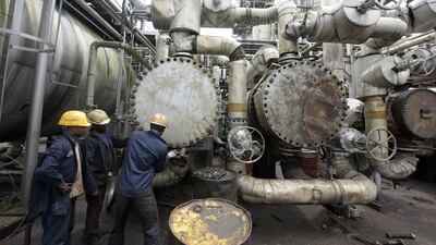 Nigeria, above, and Libya are set to add hundreds of thousands of barrels to world markets when they restart crude exports. Pius Utomi Ekpei / AFP