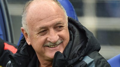 Guangzhou Evergrande head coach Luiz Felipe Scolari smiles during his team's Club World Cup quarter-final match against Club America on Sunday. Kazuhiro Nogi / AFP / December 13, 2015