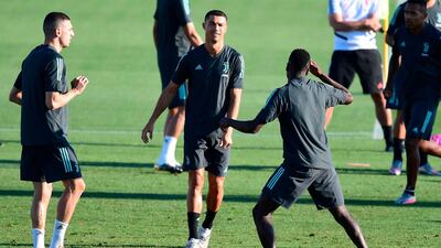 Cristiano Ronaldo training with teammates. AFP