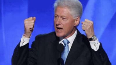 Bill Clinton gestures while addressing the 2008 Democratic National Convention.